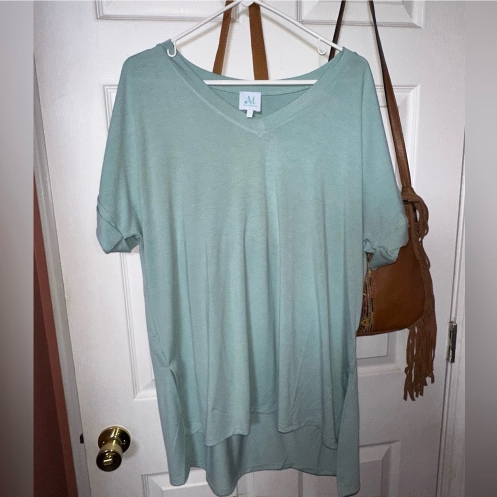 Pink lily mint green V neck top